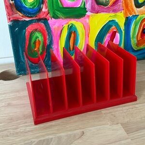 Red plastic desk organizer
